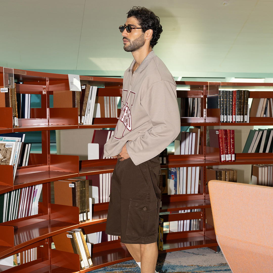 قميص بولو بأكمام طويلة للجامعة