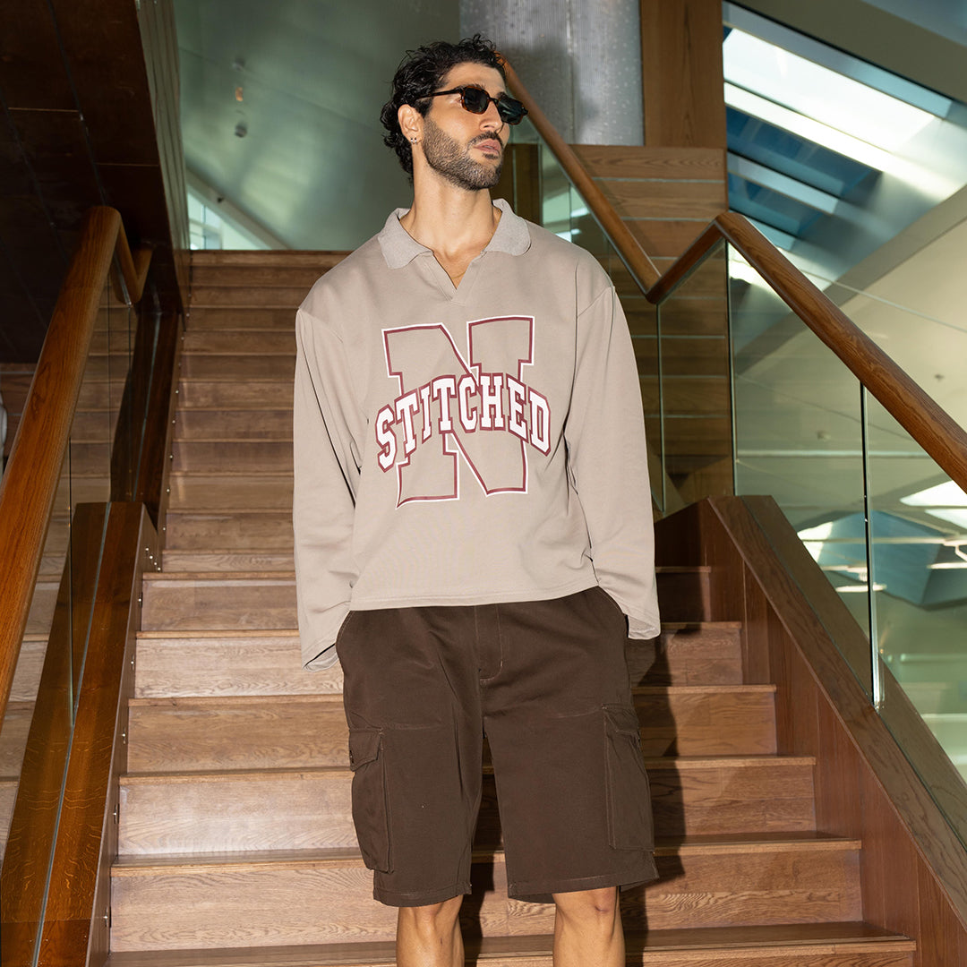 قميص بولو بأكمام طويلة للجامعة